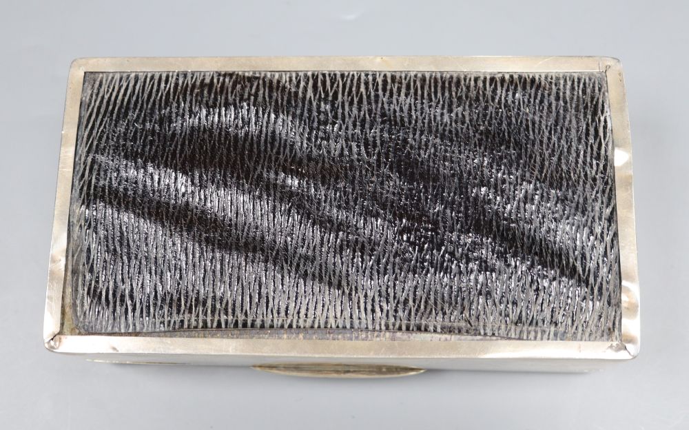 A George V silver mounted rectangular cigarette box, 16.3cm, gross 14oz.